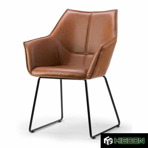 Brown faux leather dining armchair with metal end