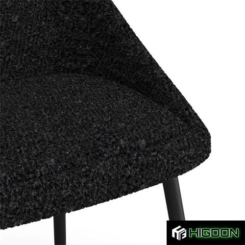 Sleek and stylish black boucle dining chair