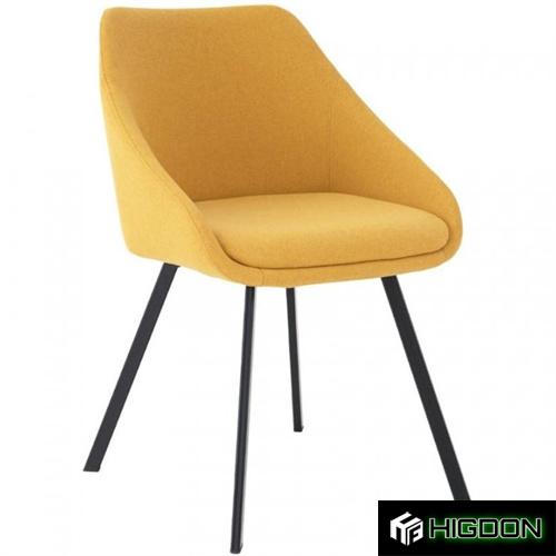 Stylish yellow fabric dining chair with cushion