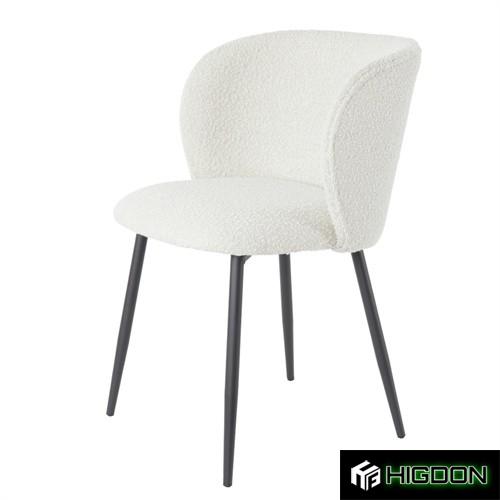 Curved back stylish white boucle dining chair