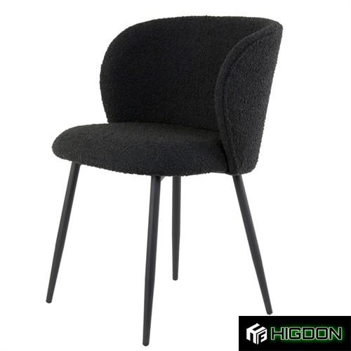 Curved back stylish black boucle dining chair
