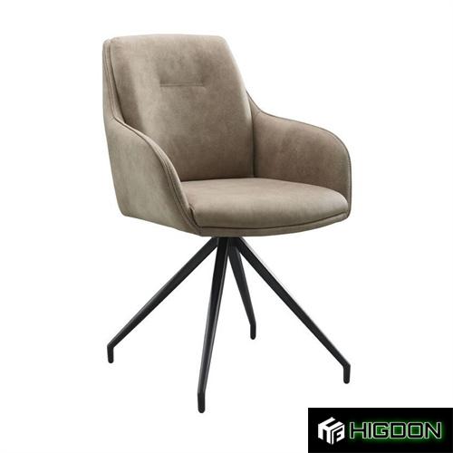 Upholstered armchair with a sleek metal base